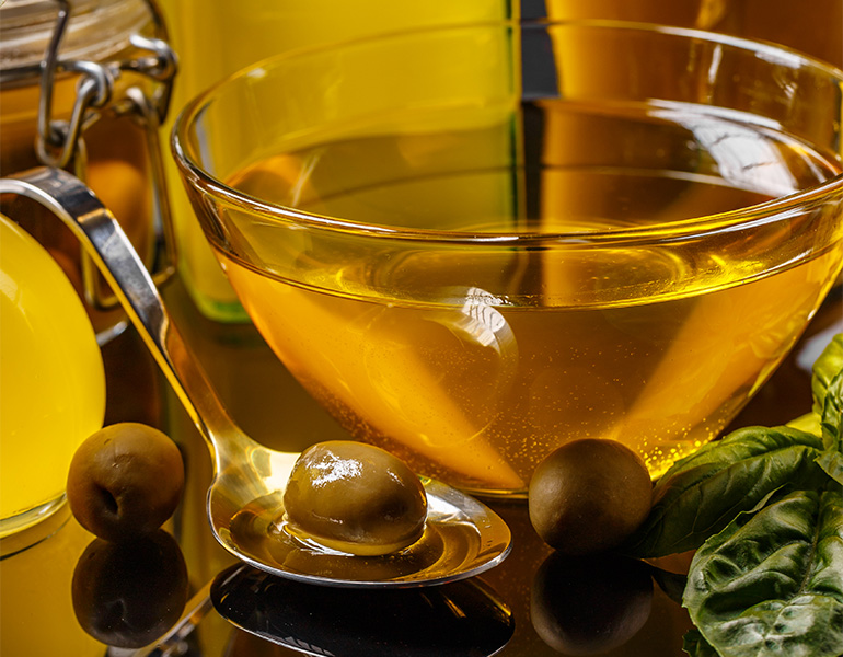The Effects of Malaxation Temperature and Harvest Time on Chemical Properties of Olive Oils